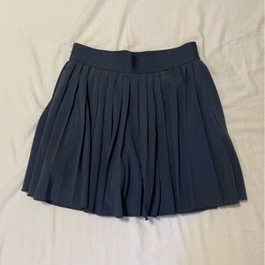 TnaMOVE Mini Pleated Tennis Skirt